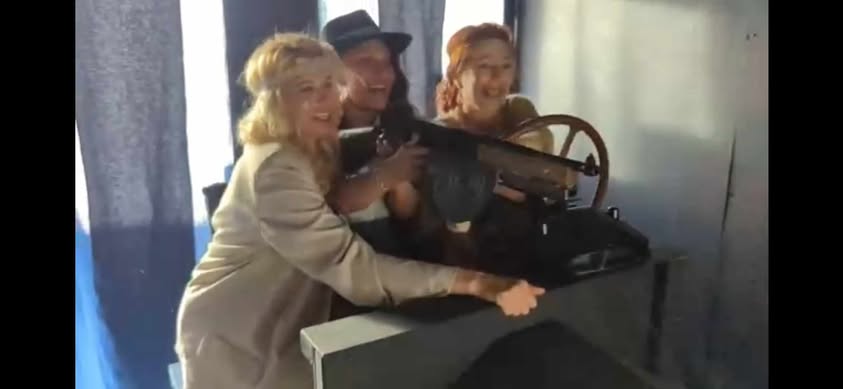 Guests ride the Model-T simulator ride - showing a side POV and their POV.